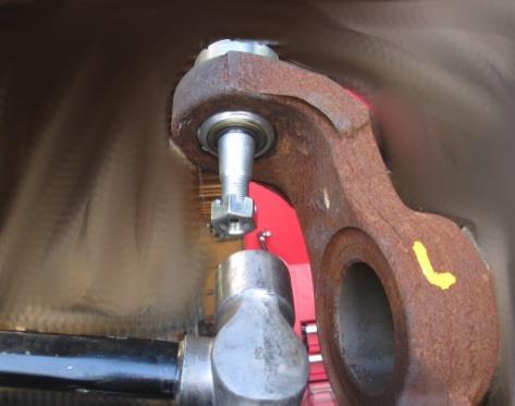8: If the ball socket and stud came out of the ball joint cup together, place the old ball socket in a vice and use a
