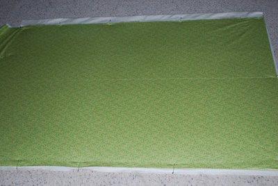 Next lay the blanket backing on top of the batting with the right side up.