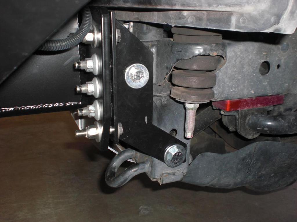 Figure 6: Steel bracket installed on car 12. If you are planning on installing a winch, bolt the winch into the bumper before installing the bumper on the car you will not be able to afterwards 13.