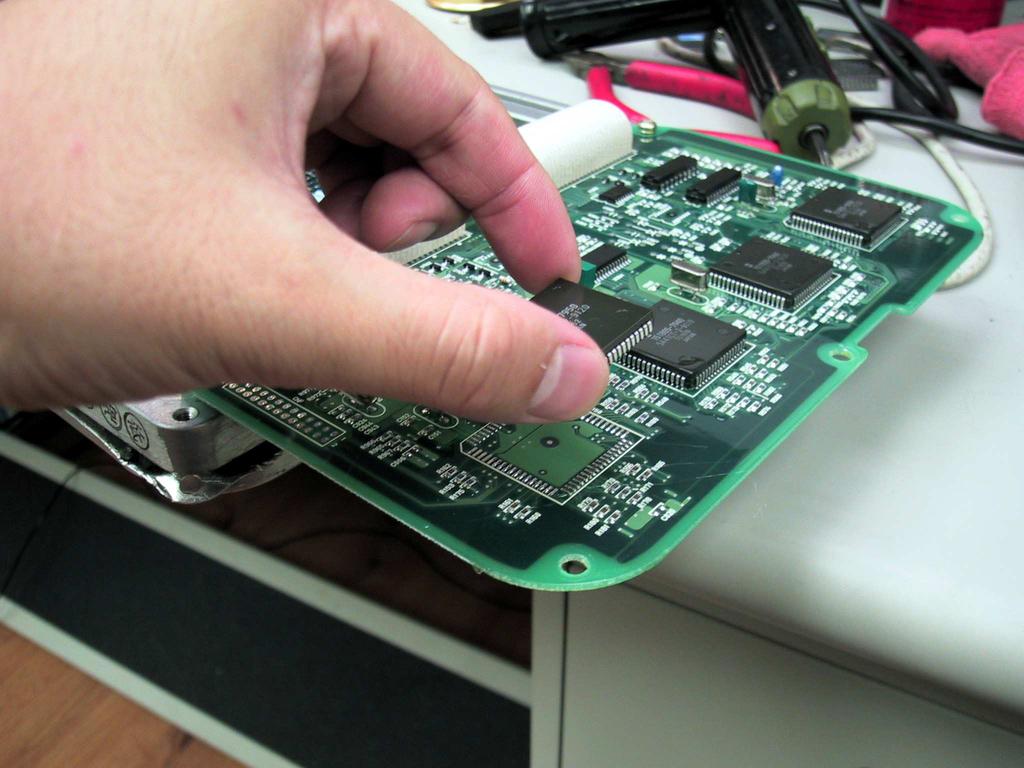 Check the position of the device, if position is right re-heat the other end of solder to secure the device completely.