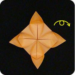 Instructions for making an origami Water Lily flower 17 5. Repeats steps 1 through 3 for the three remaining corners.