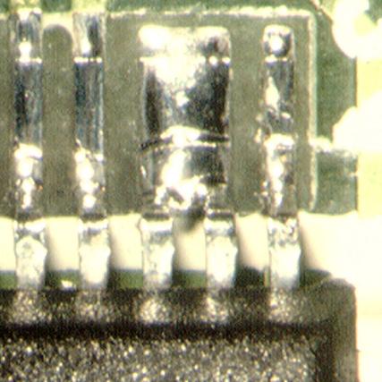 Bridging Recognized by solder running from one component