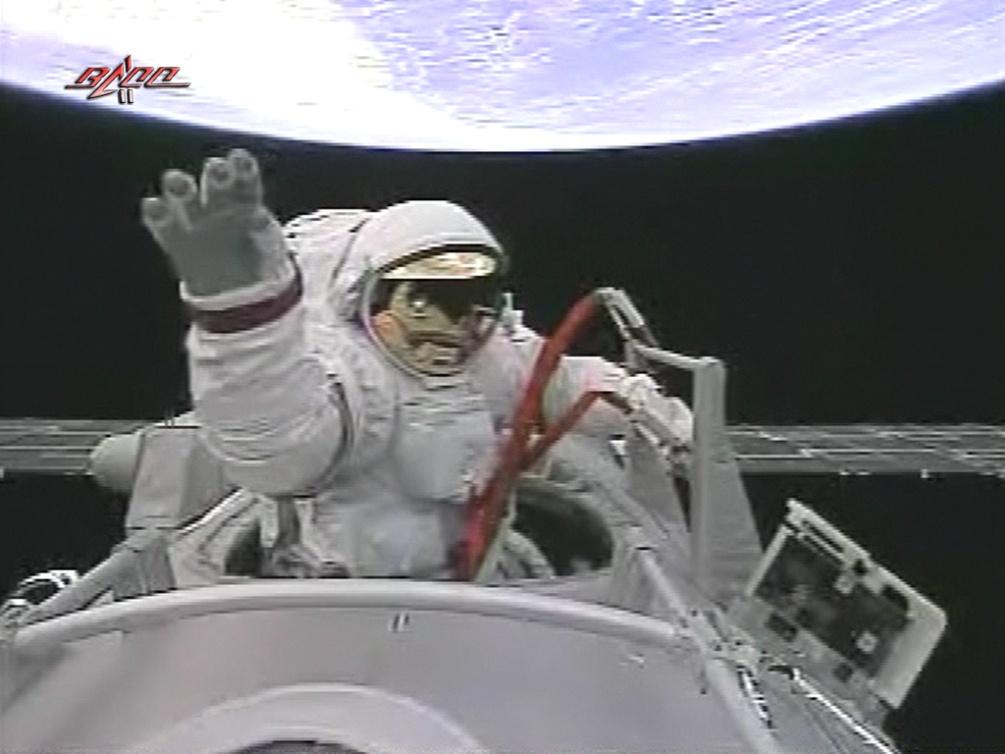 Chinese first EVA. As scheduled, Zhai Zhigang retrieved the scientific experiment devices.