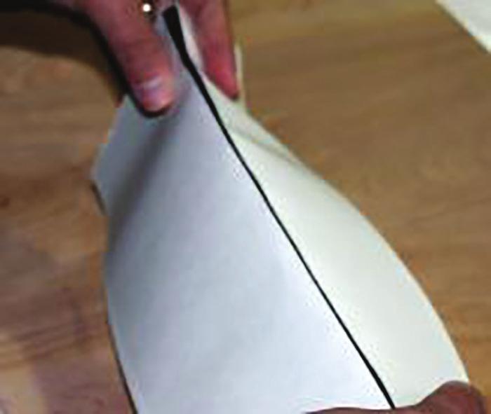 Fold FlexWrap NF in half, lengthwise, and create sharp crease at the fold. A-2.