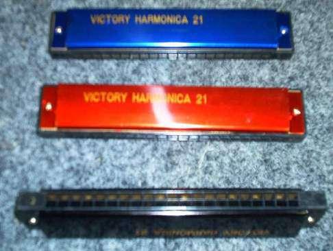 Colours: Blue, Gold, Red, Black HARMONICA 21 DOUBLE HOLE