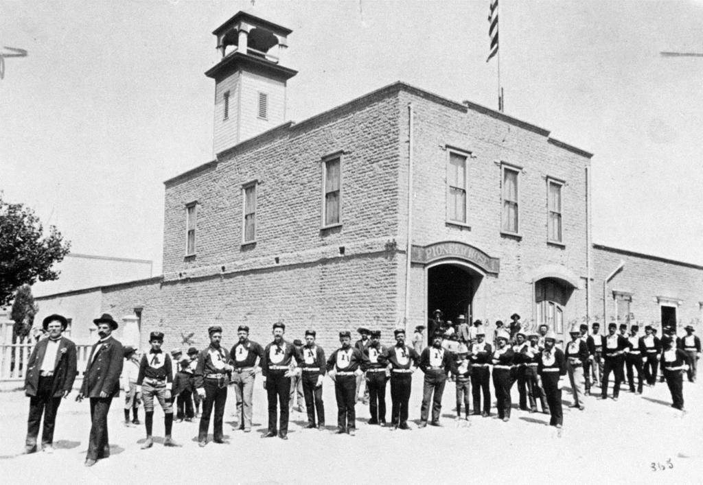 TFD members pose in front of their new fire station on Church Street in 1883. Chief Jack Boleyn is standing at the far left of the group.