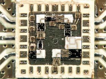 Figure 6 Photo of the quadruple LO down converter. Figure 7 Outline of signal paths within the package. circuits, existing MMIC chips are used, which are amplifiers, mixers, and multipliers.