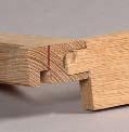Edges are typically banded with a strip of solid wood to simulate solid wood construction, but below the veneer is particleboard.