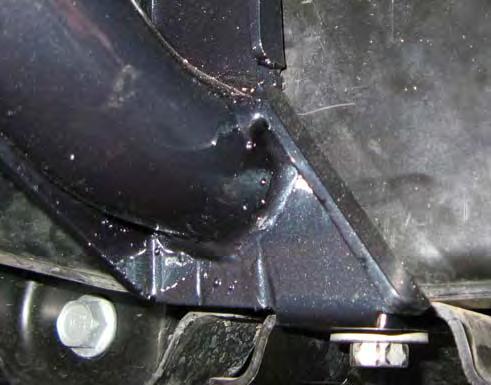 13. Fasten Front Bracket to vehicle as shown. (For Auto vehicles, use the bolt removed in step 8) A Note: For manual vehicles use Bolt M12 X 1.