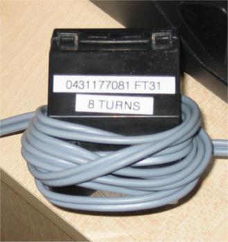 The choice of materials suitable for this purpose at LF and HF frequencies is limited. In general I would suggest using type 31 or 43 ferrite material.