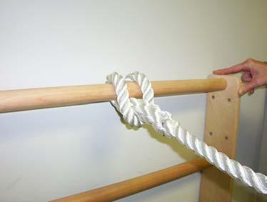 Put the tag end of the rope through the loop as shown in fig. 1. Pull on the tag end of the rope until the formed loop is tight around the ladder rung as shown in fig. 2.