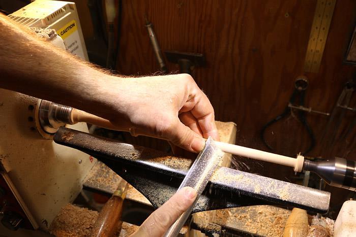 Begin tapering and shaping the shaft. I generally use a skew chisel for this. A small roughing gouge will also work. As the shaft gets thinner the fun begins.