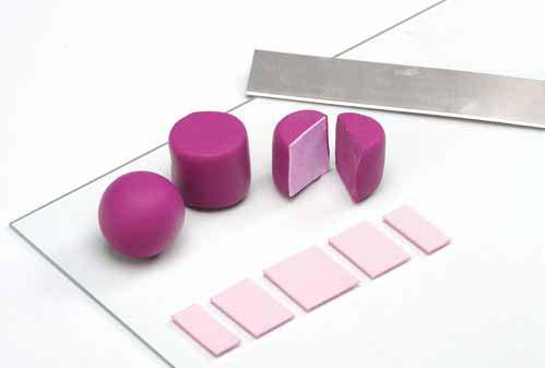 1 2 3 Shape two strips of FIMO soft violet to a ball and then form into a thick cylinder. Divide the cylinder in the middle using a thin blade.