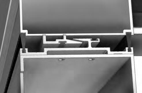23 FIXED PANEL JAMB TOP VIEW 5. Close the inactive sliding panel and engage the upper and lower flush bolts.