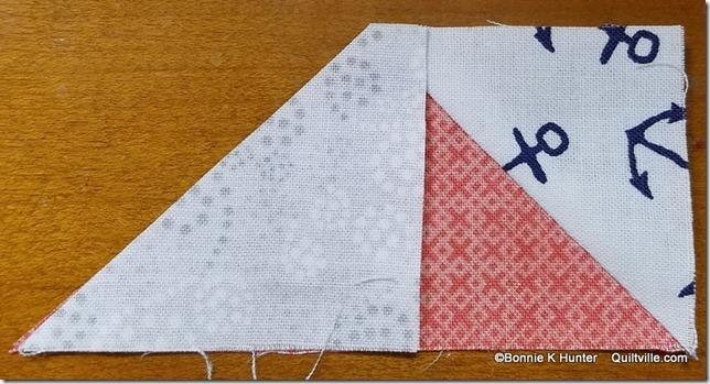 I will make bonus triangles using the double line method and the Bonus Buddy Ruler on any stitch & flip corner that is 2 1/2'' square or
