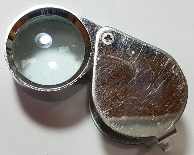 ! If you have some Blu Tack then this can help keep the SMD IC in position while you solder it. A jeweller s loupe is really useful for inspecting small components and soldered joints.