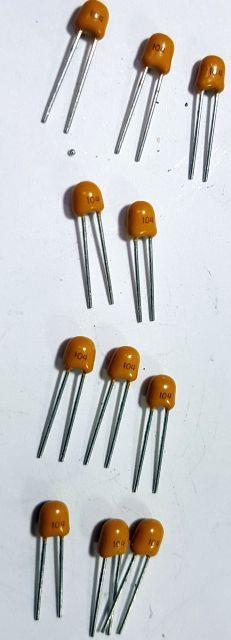 4.6 100nF capacitors. There are 11x 100nF capacitors in the kit.
