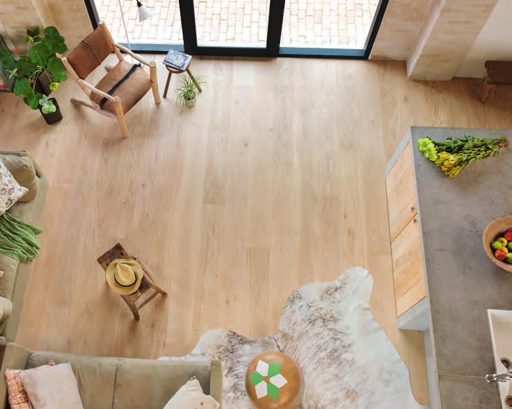 This lends the engineered wood floor a softer, whiter look instead of the somewhat orangey tint of a natural treated oak.