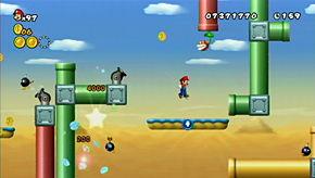 At the very end of the level where the warp pipe leads up to the flag, there's a green horizontal pipe with a Piranha Plant in it, and a red horizontal pipe above it.