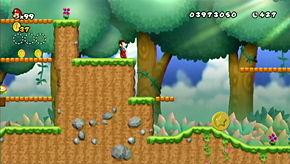 The first coin of the level can be found just past the first set of