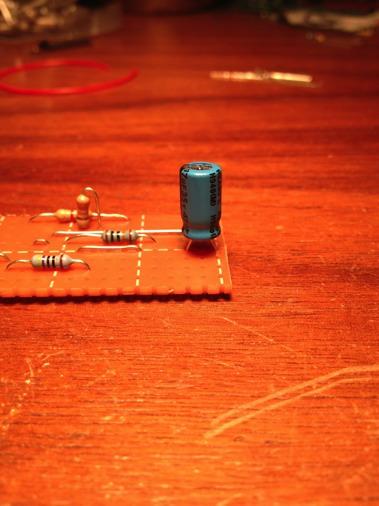 Solder a 47µf capacitor between rows A and C in column E.
