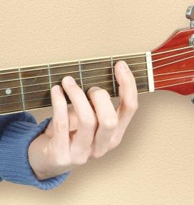 If you are playing an acoustic guitar, play the minor chord as an open-position chord, instead of using a barre. o form the open-position minor chord, see page 66.