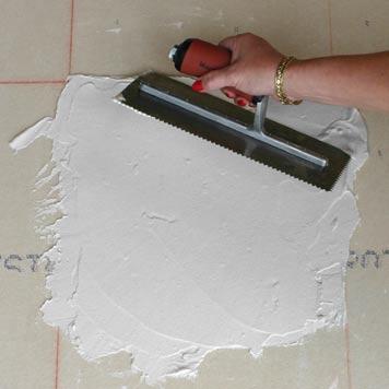 Don t worry about how thick the thin set is at this time, you ll adjust the thickness in the next step. Only cover an area which can be tiled in 10 to 15 minutes.