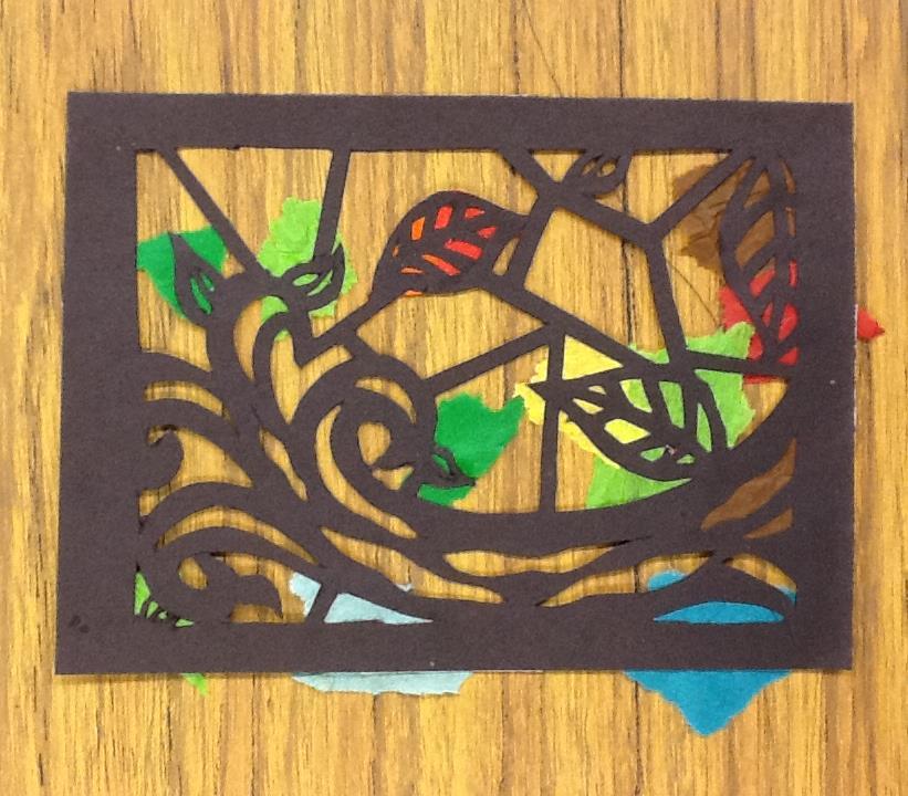 ART NOUVEAU STAINED GLASS STEPS 9. Using a little white glue, torn tissue paper, and patience, begin adding pieces behind your design.