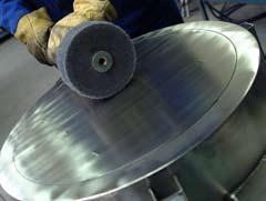 Preliminary grinding with the unitized material is an