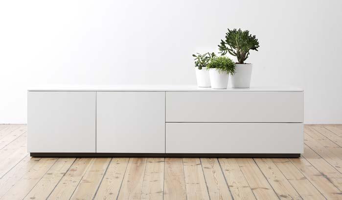 Arctic frame, shelves and fronts are made of white lacquered MDF in Lammhult Sweden. Arctic sideboard is available with front doors in gray cement, a novelty for this year.