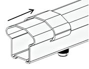 Slide bottom brackets (E) with screw holes down and counter bore holes facing toward the balusters, over each end of the bottom rail (B). 6.