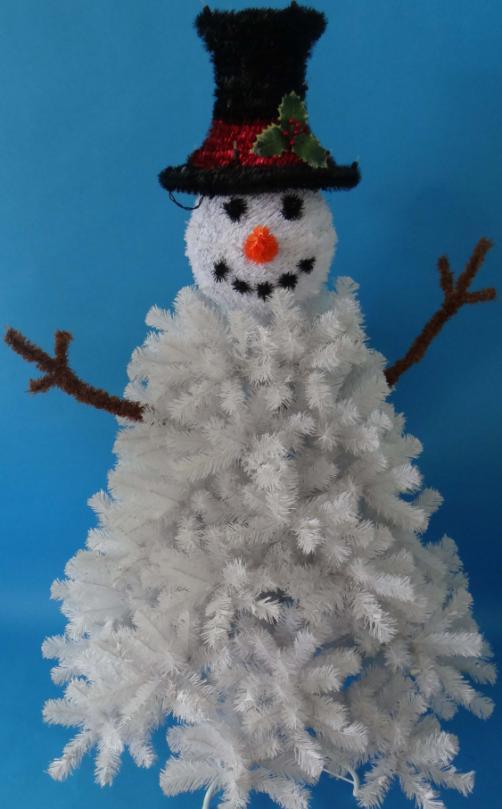 Step 5: Locate the Hat and place it onto the pole coming off of the top of the Snowman s Head. Step 6: Tie the Scarf around the Snowman s neck. Step 7: Time to light your Tree!