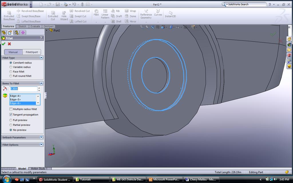 Extrude the wheel rims so that it is 2.0 in from the mid plane.