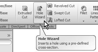 After selecting the front face select the Hole Wizard icon from the Features toolbar.
