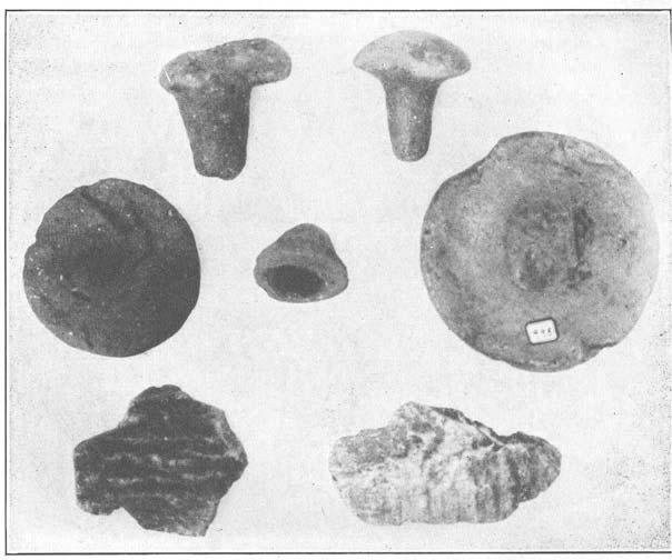 278 ANCIENT LIFE IN KENTUCKY FIG. 164. UNIQUE POTTERY PIECES. Showing water-bottle stoppers, dish covers and shards of soap-stone bowls. by Harrington from Lenoir Island, Tennessee.