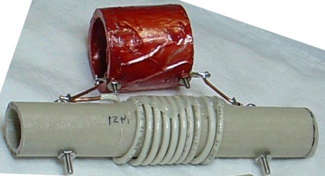 the 1 OD fiberglass rod as the coil form, a 9-turn coil over 1.5 of length gives the required inductance. See Figure 1 and Photo C for the trap details.