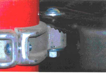 Picture shows deck clamp being tightened to post with a 3/8 X 1 ¼ Button Head bolt with a T nut on the deck side of the clamp. DO NOT over tighten. If too tight the post will swing.