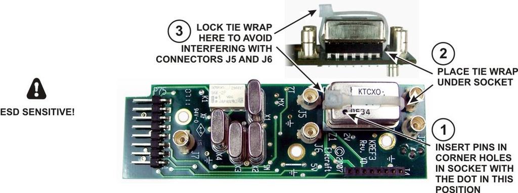 Mount the TCXO module on the KREF3 board as shown in Figure 78. Be certain the leads go into the corner holes in the socket and the black dot is oriented toward connector J6 as shown.