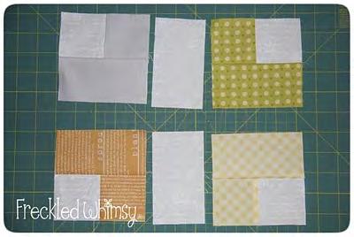 5. Sew a white BG piece measuring 2.5" x 4.5" between each set of 4 patches.