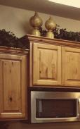 Drawer boxes are 5/8 solid wood dovetail Drawer fronts are solid wood with finger pull Doors are a five piece with concealed hinges and finger pull Hinges have a six way adjustment Knotty Alder This