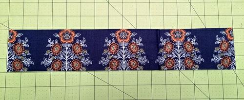 Fold the strip in half, wrong sides together, so it is now 1½" x 16".