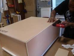 Install cabinet back by aligning the dado channel with the cabinet floor and