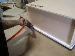 Using a staple gun, shoot staples from the exterior, into the side panel and