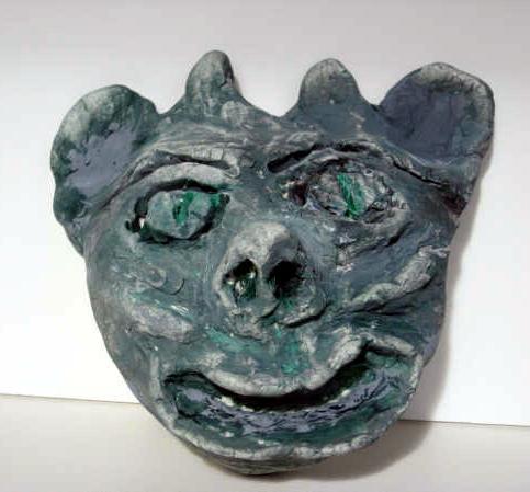 Students should use a very wet brush or damp sponge to paint the gargoyle. Rinse the sponge to reapply paint or remove excess paint.