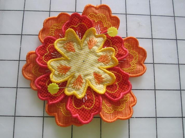 pdf instructions included with the embroidery design collection for completing the 3-D Appliqué Flowers.
