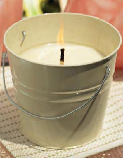 VG03 TRIANGLE VOTIVE AND HOLDER $10 Nice sized stylish votive candle great for any décor! 2 oz.