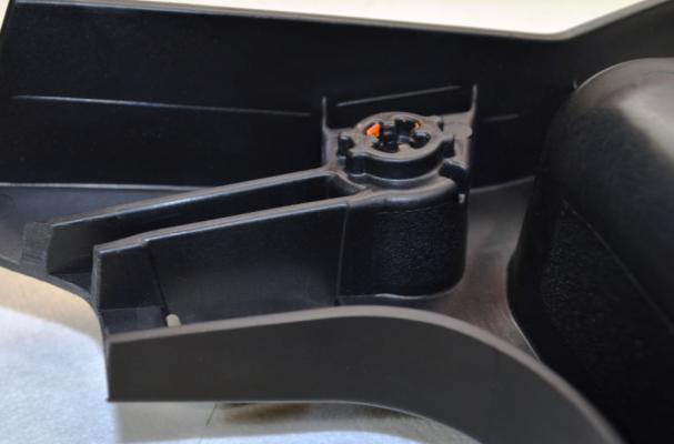 32. On the underside of the seat support, remove the left & right inside rib material as shown in the illustration below. 35. Reinstall rear grab handle.