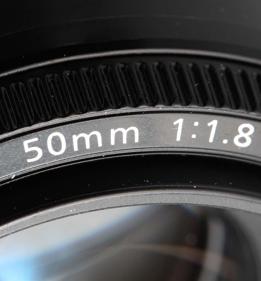 If there are two numbers, then the lens is a zoom lens and in the example shown on the right has a range starting at 24mm and going up to 105mm.