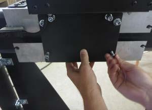 Transferring the Chuck Step 1: Use the chuck key located in the slot on the top of the chuck to