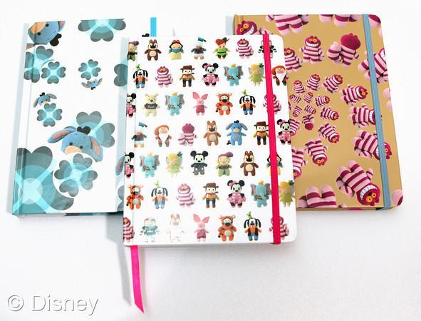 collection of Pook-a-Looz-branded hardcover journals.